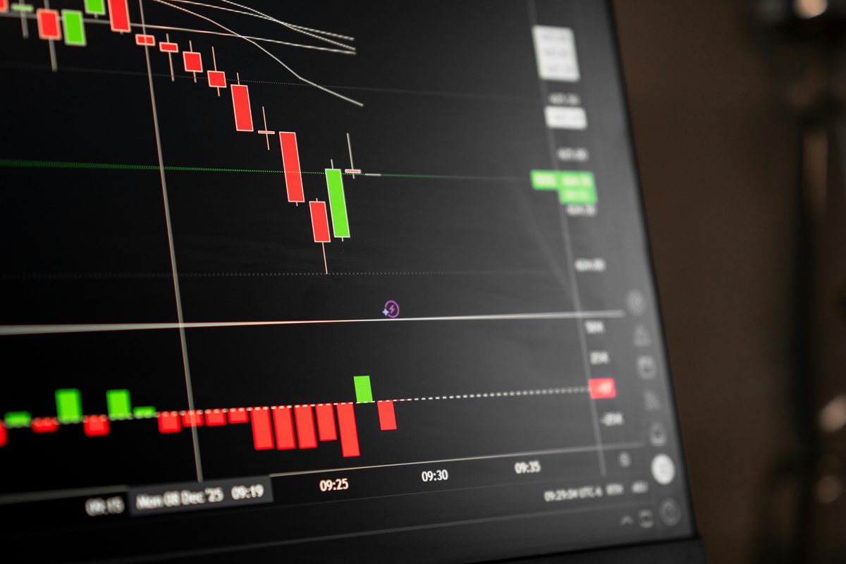 Candlestick chart on a trading screen — the architecture of money made literal